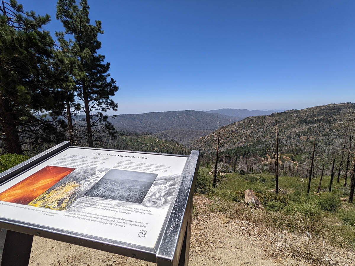 This is a photo of an area hit by the Rough Fire of 2015, taken from the McGee Overlook along Highway 180. It offers a view of where the 1955 McGee Fire and the 2015 Rough Fire burned though this drainage on Giant Sequoia National Monument. — Claudia Elliott, Aug. 12, 2022